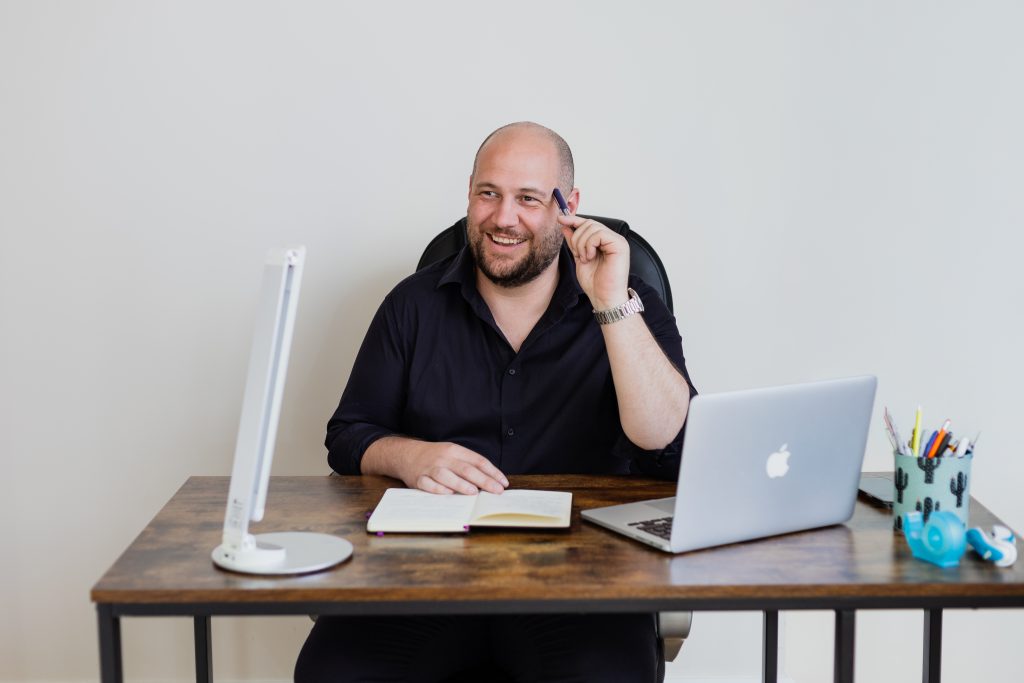 Tech company CEO professional portrait working at his desk