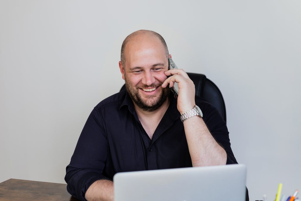 Tech company CEO professional portrait working at his desk